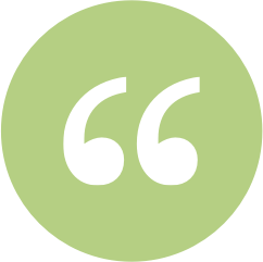 White quotation mark inside a green circle symbolizing quoted text or a quote